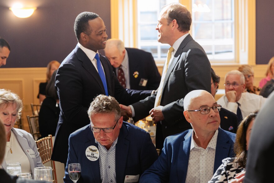 Republican Kentucky candidates for U.S. Senate Daniel Cameron and Andy Barr shake hands during the Kenton County Republican Party Lincoln Day Dinner, Thursday, April 30, 2026, in Covington, Ky. (AP Photo/Jon Cherry)