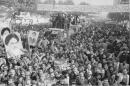 In this Nov. 27, 1979 file photo, demonstrators, including oil tank drivers with their vehicles, protest in front of the U.S. Embassy in Tehran, Iran. (Mohammad Sayad/AP)