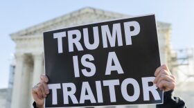 Protesters demonstrate outside of the U.S. Supreme Court in Washington, DC.