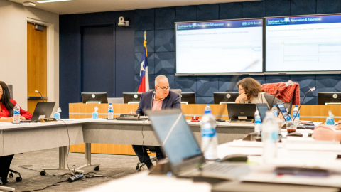 TCC Chancellor Eugene Giovannini, left, chats with TCC board President Teresa Ayala during a meeting Feb. 10, 2022.