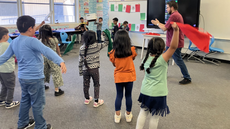 Students in the Migrant Education Student Academy in King City learn a dance from a visiting teacher from Mexico.