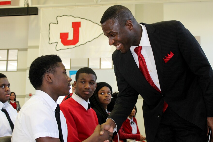 Jennings Freshman Kevion McKay shakes hands with Superintendent-elect Art McCoy Friday, Feb. 19, 2016.