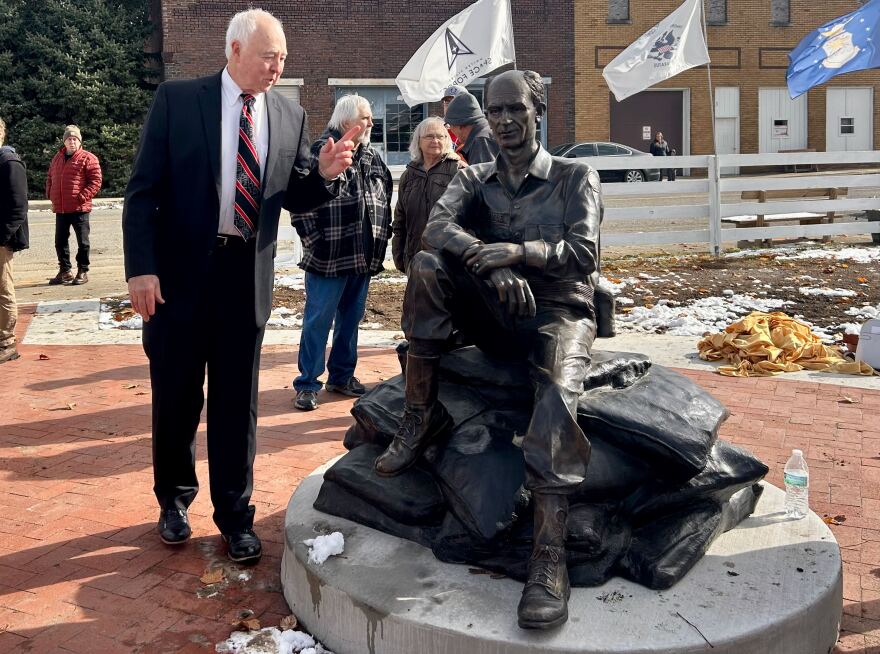 The Ernie Pyle statue in Dana, Ind., was dedicated on Veterans Day. Steve Key, president of the group that operates the Ernie Pyle World War II Museum in Dana, stands next to the statue.