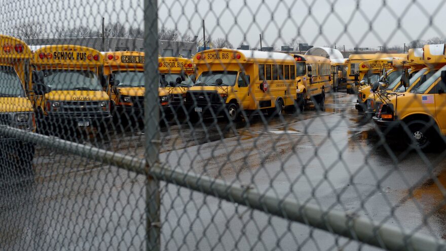 All locked up: School buses sat idle this morning in the Jamaica section of New York City.