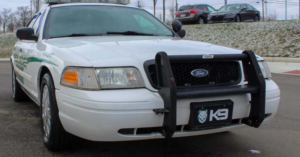 A police car in the rear view: Crown Vics now grace Ohio museums