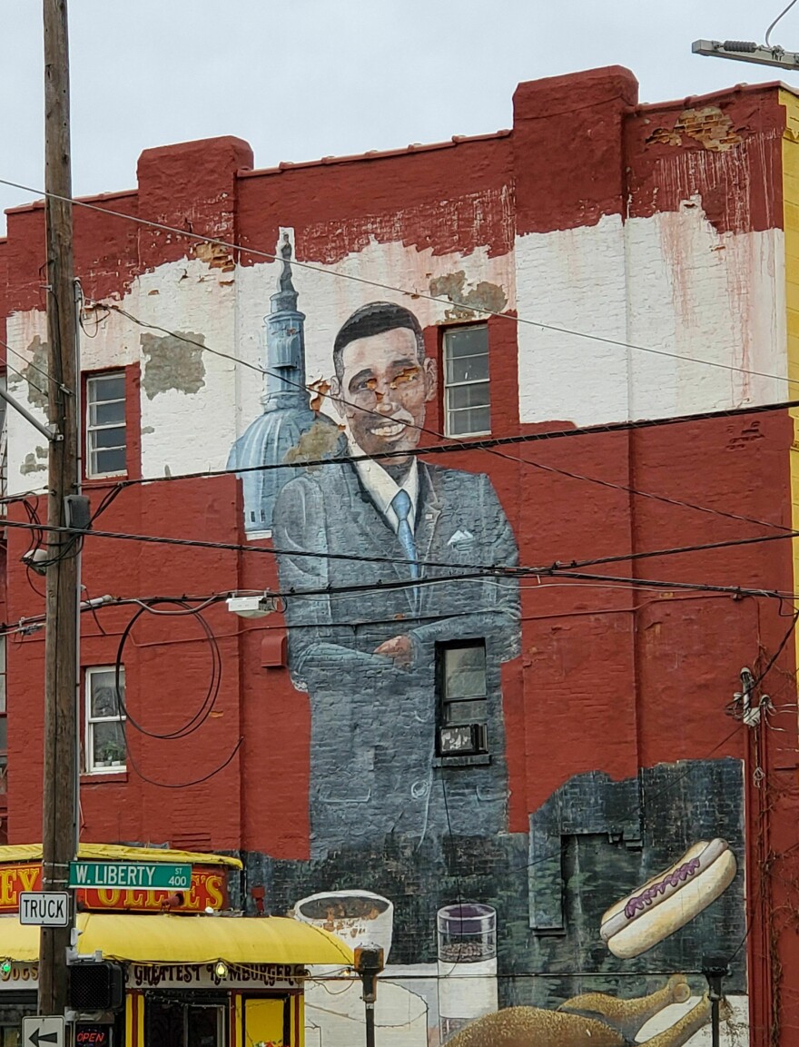 Rankins' portrait of President Barack Obama stood in the West End from 2008 to 2019. Ollie's Trolley owner Marvin Smith says the mural and the wall behind it were both badly deteriorated, necessitating painting over the image. Rankins had lost his eyesight by that point and could not repaint it.