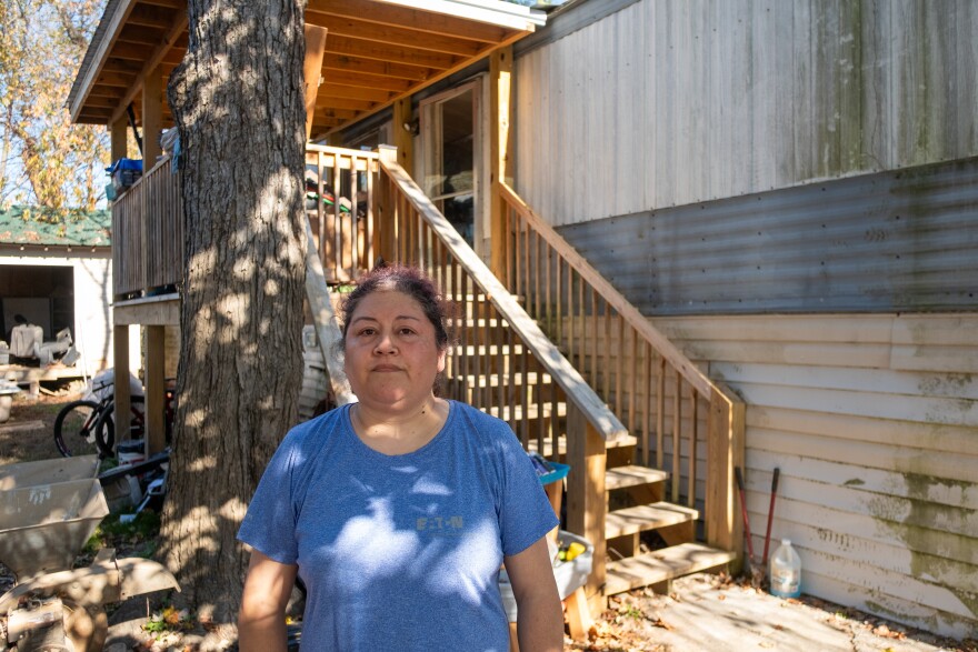 Nadia Paz stands outside her trailer on Duck's Drive in Brevard.