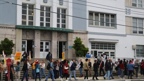 Teachers hold a practice picket outside Washington High on November 12, 2025.