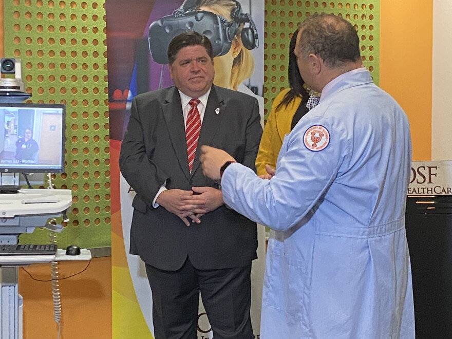 Gov. J.B. Pritzker visited OSF HealthCare's Jump Simulation Center on Feb. 25 to discuss how broadband internet can bring telehealth to rural communities.