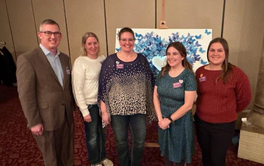 Staff of Children’s Grief Center poses for a portrait.