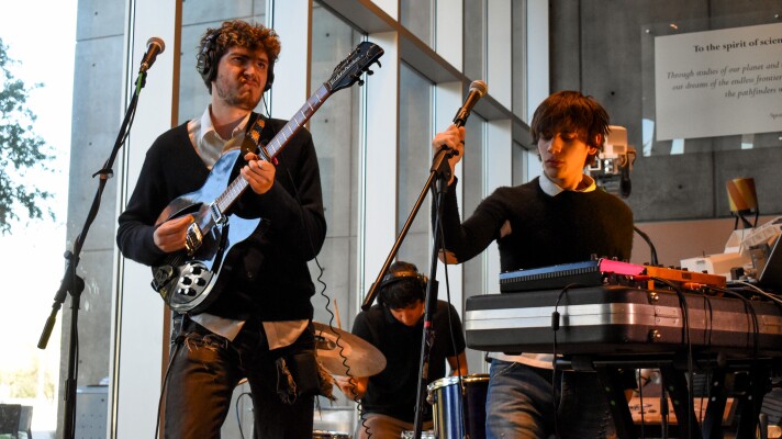 (From left) Dace Santa Cruz, Jhasiel Mora and Keanu Klepfer of Belgium Tree perform at ASU's School of Earth and Space Exploration in Tempe.
