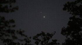 The planets Venus, bottom, and Jupiter, top, light the sky above Matthews, N.C., Monday, June 29, 2015.  (Chuck Burton/AP)