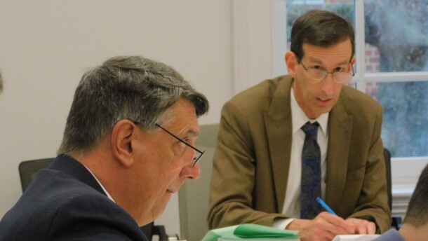 Senate Budget and Taxation Committee Chair Guy Guzzone (left) listens to budget alterations relayed by Department of Legislative Services Fiscal and Policy Analysis Coordinator David Romans (right) on Friday in the Department of Legislative Services Building in Annapolis, Md.