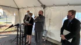 Local officials speak at Wednesday's press conference outside the Greene County office building