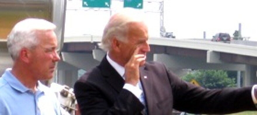Contractor Bill Clarkson(l) views job site with V.P. Joseph Biden.