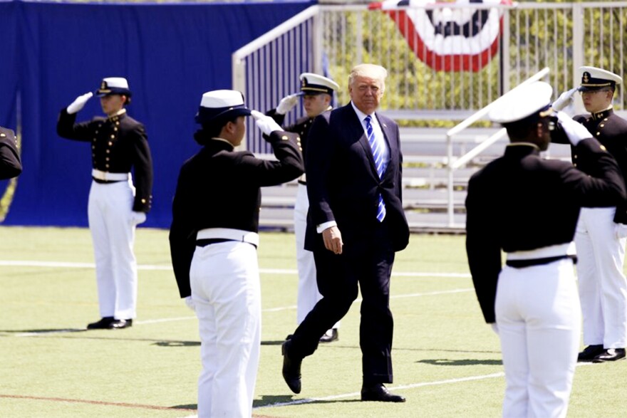 FILE: President Donald Trump arrives to speak to graduating cadets at the United States Coast Guard Academy in New London, Connecticut May 17, 2017.