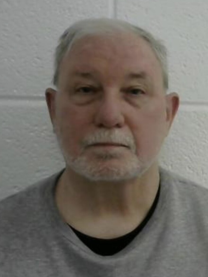 Former Laurel, Md., police chief David Crawford is under arrest, facing dozens of criminal charges related to a string of arson attacks on homes and garages.