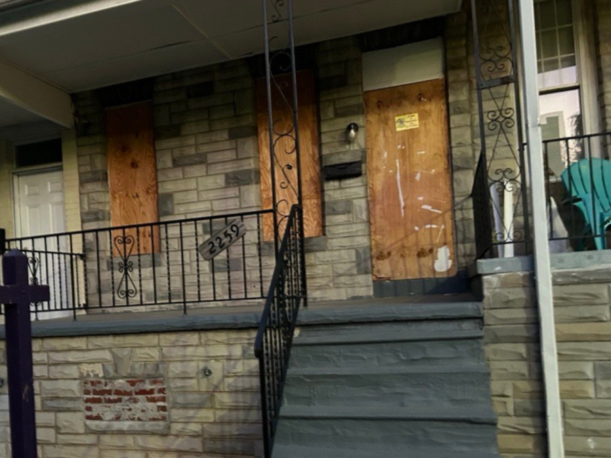 A boarded up rental rowhome in South Baltimore.