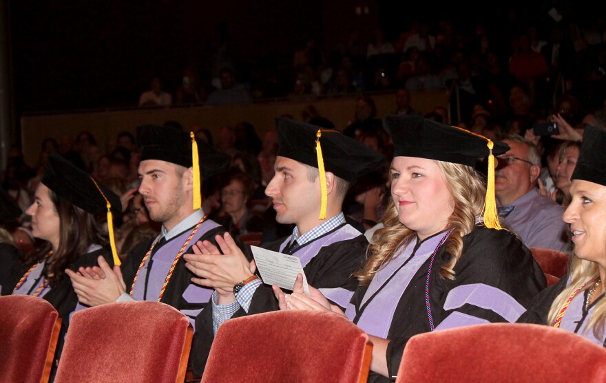 The inaugural class of A.T. Still University-Missouri School of Dentistry applauds a speech during their graduation ceremony June 10, 2017.