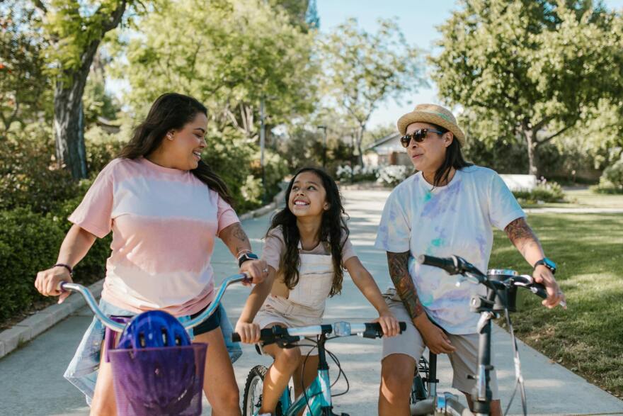 A family riding bicycles together.