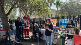 Immigrant and human rights advocates, along with religious leaders, held a vigil on Wednesday, Dec. 17, 2025, outside the U.S. Immigration and Customs Enforcement facility in Miramar to mark International Migrants Day.