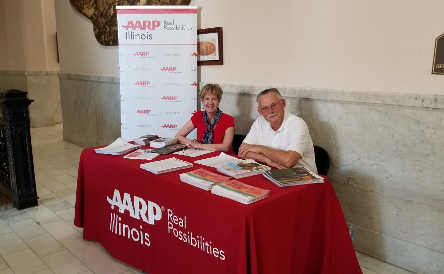 Volunteers provide information from our sponsor, AARP Illinois.