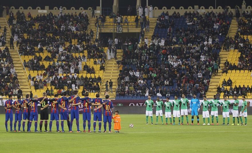 Before a 2016 match in Qatar, members of Saudi club Al-Ahli Saudi FC (right) did join FC Barcelona in observing a moment of silence.