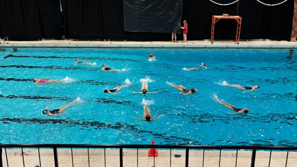 A group of Sharks are in formation as they rehearse for their pageant. This year's show falls on the club's 100th anniversary, making them the oldest synchronized swimming club in the nation.