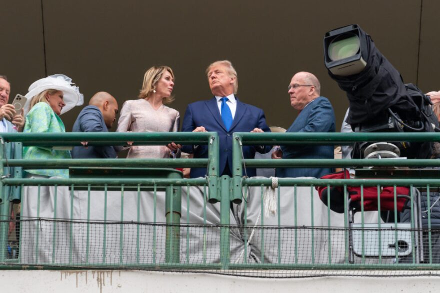 Donald Trump made an appearance at the 148th Kentucky Derby, flanked by former U.N. Ambassador Kelly Craft and Alliance Coal CEO Joe Craft.