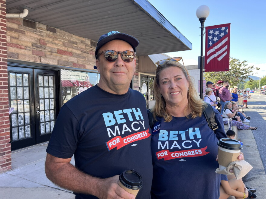 Meredith and Tom Roller of Roanoke supporting Beth Macy along the parade route.