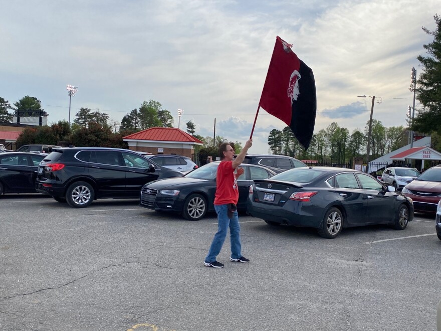  A supporter of the Red Raider mascot shouts at protesters at a football game earlier this year.