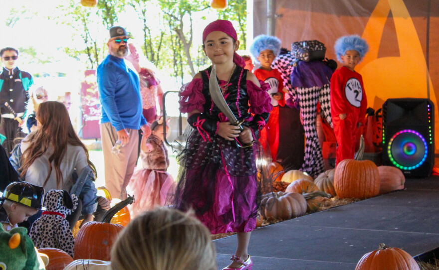 Pirate Izabella walks the stage during the costume contest.