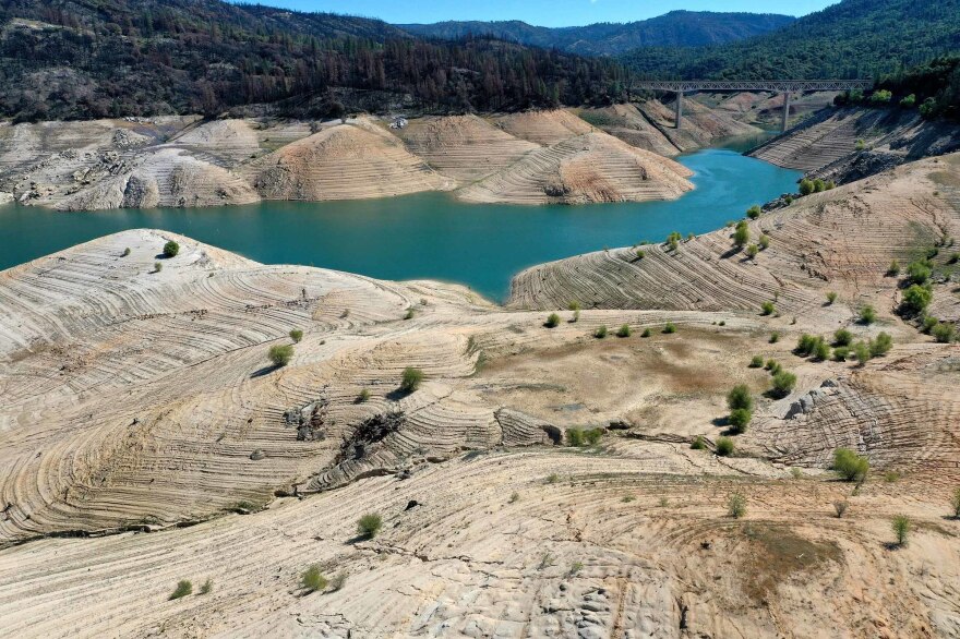 Warmer temperatures are leading to emptier reservoirs across the West, such as Lake Oroville in Northern California.