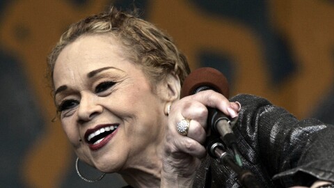 In this April 29, 2006 photo, Etta James performs during the 2006 New Orleans Jazz and Heritage Festival in New Orleans. James, the feisty rhythm and blues singer whose raw, passionate vocals anchored many hits and made the yearning ballad "At Last" an enduring anthem for weddings, commercials and even President Barack Obama.