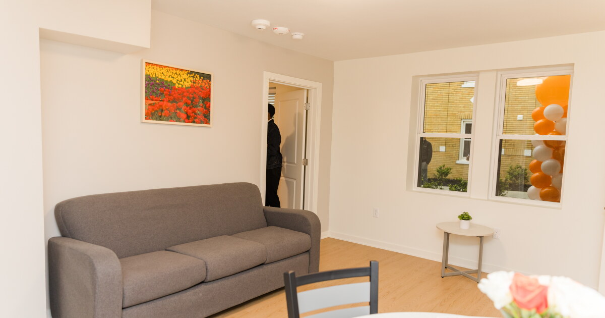 An apartment-style living room inside a domestic-violence survivor shelter.