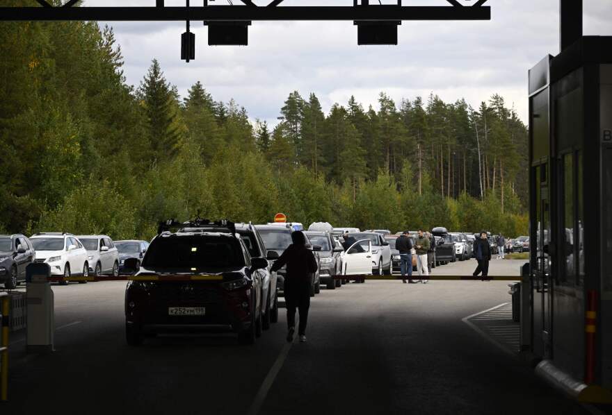 Cars coming from Russia wait in long lines at the border checkpoint between Russia and Finland near Vaalimaa, Finland, on Thursday.