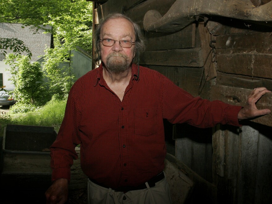 Donald Hall, former poet laureate of the United States and author of numerous poetry books, poses in 2006 in the barn of the 200-year-old Wilmot, N.H., farm that has been in his family for four generations. Hall died on Saturday at age 89.