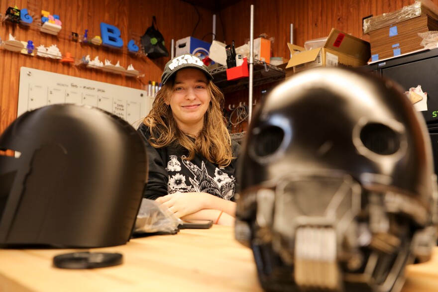 UWF student Brianna Bailey inside the Makerspace at the Museum of Commerce 