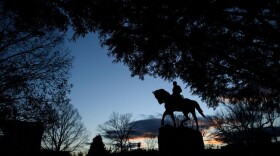 A statue of Confederate General Robert Edward Lee is seen in Market Street Park during the first day of jury selection for James Fields's murder trial at the Charlottesville Circuit Court, November 26, 2018 in Charlottesville, Virginia.  (Brendan Smialowski /AFP via Getty Images)