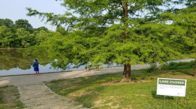 People continued to fish Tuesday morning despite a sewage spill into Winton Lake at Winton Woods.