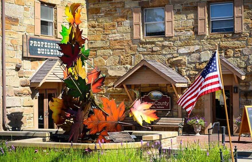 The sculpture's 22 large, colorful fall leaves represent the average number of veterans who commit suicide each day.