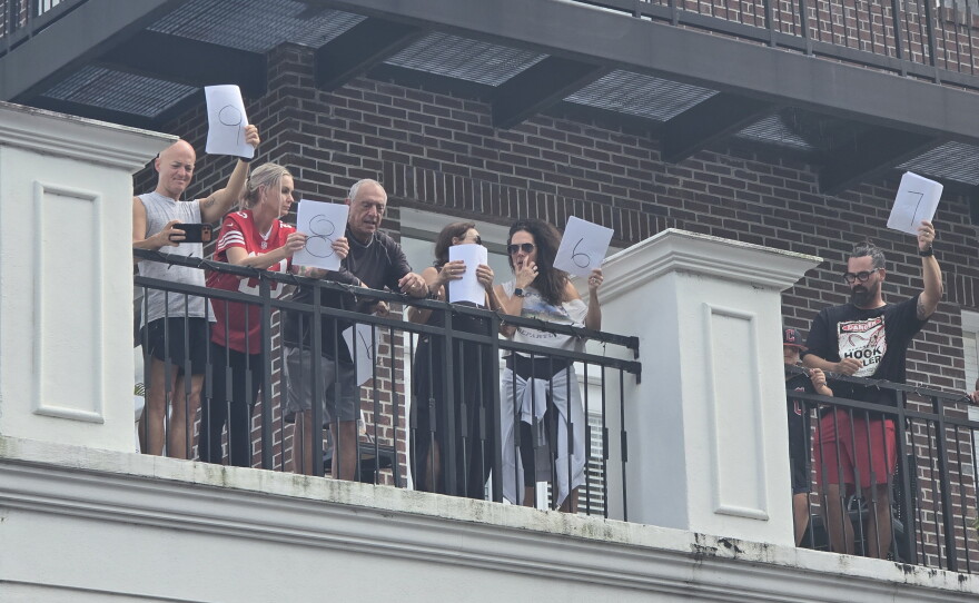 Baldwin Park residents judging bellyfloppers from their balcony at Franco's Flop Fest on Sunday, September 20, 2026.