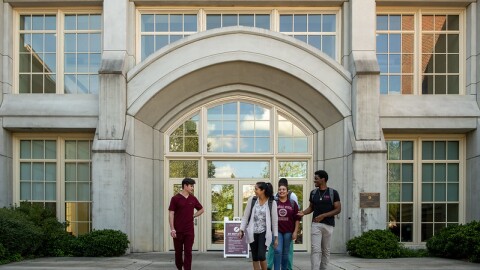 students walk out of the FSU Med School