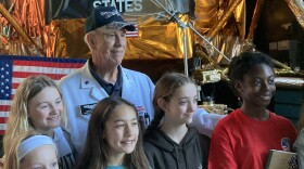 Retired NASA engineer Craig Sumner and young visitors to the U.S. Space and Rocket Center