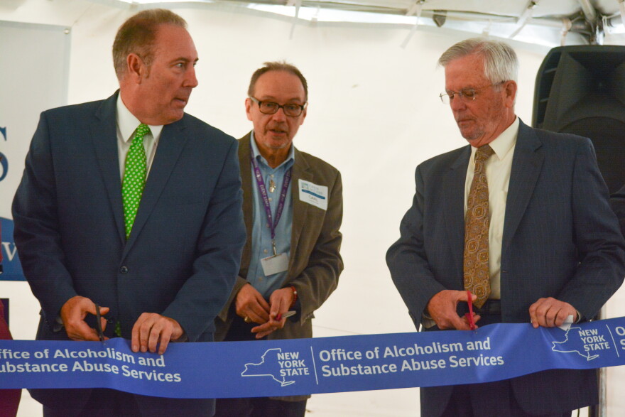 Senator Joe Robach, Carl Hatch-Feir, president of RecoveryNet and David Putney, Director of Monroe County Office of Mental Health cut the ribbon to Open Access.