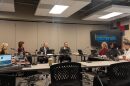 Gov. Mike Kehoe talks with the State Board of Education meeting during its December 2024 meeting before officially taking office in January 2025.