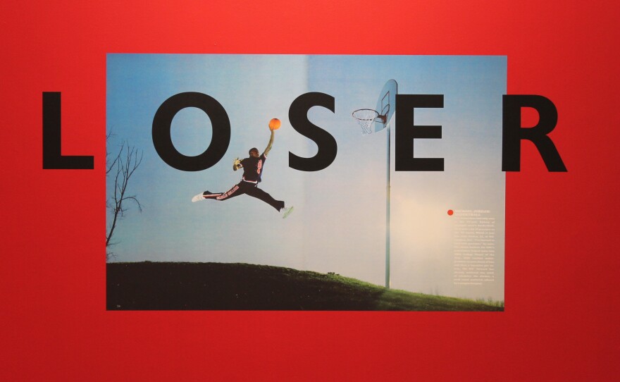 Phtos of Johaness Barfield's murals on display at the Greenville Museum of Art.