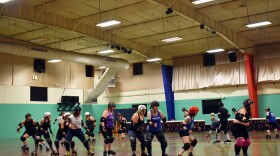 Skaters on the Dockyard Roller Derby league in Tacoma practice on Monday, June 12. // Lauren Gallup NWPB