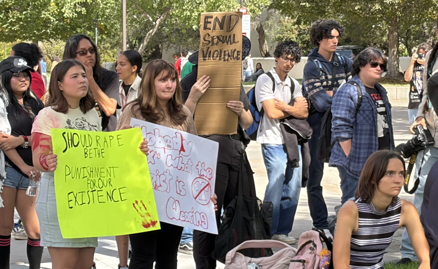 Protesters gathered outside SUB Mall on Wednesday in the wake of a lawsuit against Cornell University by a woman who said she was gang raped.
