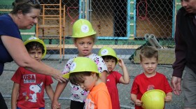 In August 2024, Ithaca’s Coddington Road Community Center announced it would expand to respond to rising demand for child care. Kids from the child care center showed off their hard hats in front of the construction site.